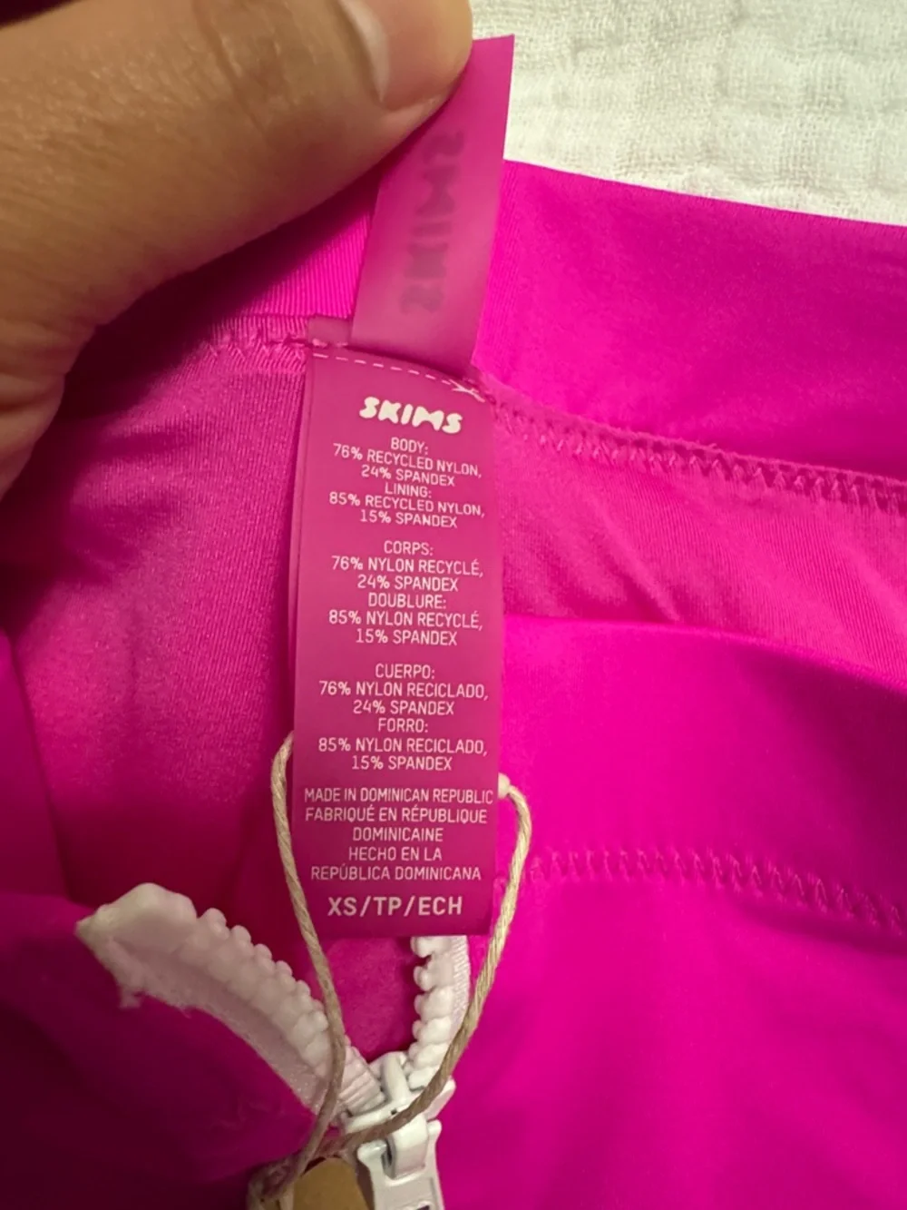 SKIMS Hibiscus (Pink) Sporty Zipper Swim Shorts - Picture 6 of 8